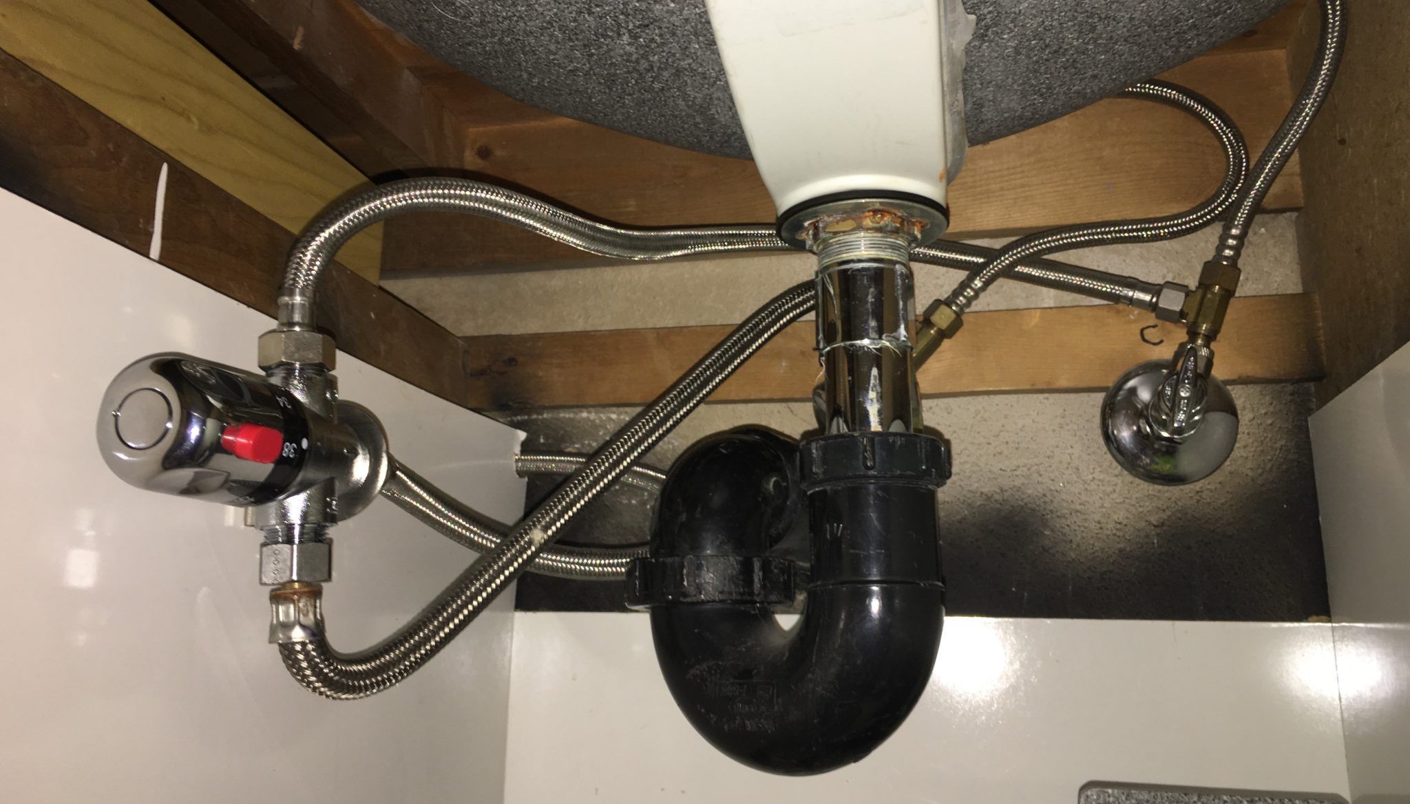 two valves under kitchen sink